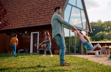 family enjoying yard cropped